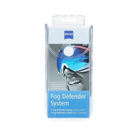The ZEISS Fog Defender System’s packaging depicts a goggle-wearing individual, highlighting its Safe & effective fog prevention feature. The set includes a 15ml anti-fog spray bottle and a microfiber cloth, ideal for keeping lenses clear.