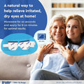 A smiling older woman and younger woman embrace on a couch. Text reads: Bruder Mask Moist Heat Dry Eye Compress by Bruder offers a natural way to relieve irritated, dry eyes! Microwave for 20 seconds and apply for 8-10 minutes for best results. An image of an eye compress is shown.