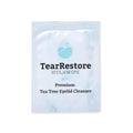 A 30-count packet of TearRestore HylaWipe Tea Tree Lid Hygiene Wipes provides a hydrating formula for eyelid hygiene. The packaging features a white design with a blue drop logo at the top.