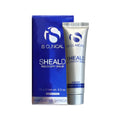 A 15g (0.5 oz) silver tube of iS Clinical Sheald Recovery Balm stands beside its blue box, featuring blue text and offering intense hydration ideal for sensitive skincare needs.