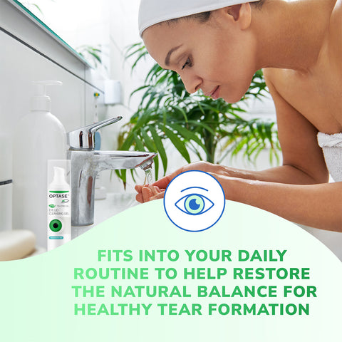 A woman with a white towel on her head washes her face at the sink, where a bottle of Optase Tea Tree Oil Eye Lid Cleansing Gel sits on the counter. Text reads: Integrate it into your daily routine for preservative-free eyelid hygiene to help restore natural balance for healthy tear formation.