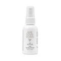 The 50mL We Love Eyes Calm Eyelid & Eyelash Cleansing Spray boasts a minimalistic white bottle with a spray nozzle, enriched with soothing chamomile and labeled in English and French, featuring a heart symbol for gentle cleansing.