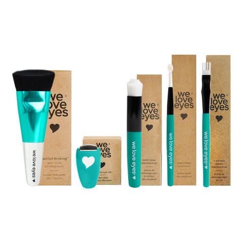 The We Love Eyes Complete Toolkit for Eyelashes offers teal-handled lash and brow brushes, a teal brush cleaner, and stylish packaging with a white heart design and brand name in lowercase, ideal for eyelid margin cleansing.