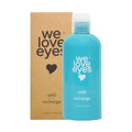 The We Love Eyes Tea Tree Eyelid Foaming Cleanser Refill features a blue 250mL bottle with a heart logo, set against a matching brown box.